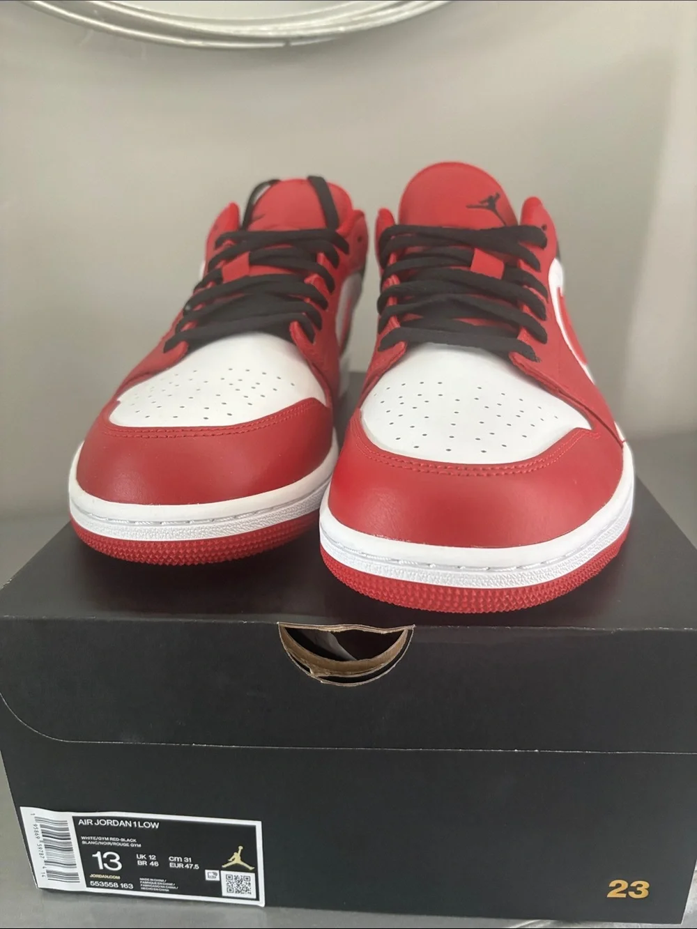 Jordan Low Top Sneakers in Red, White and Black